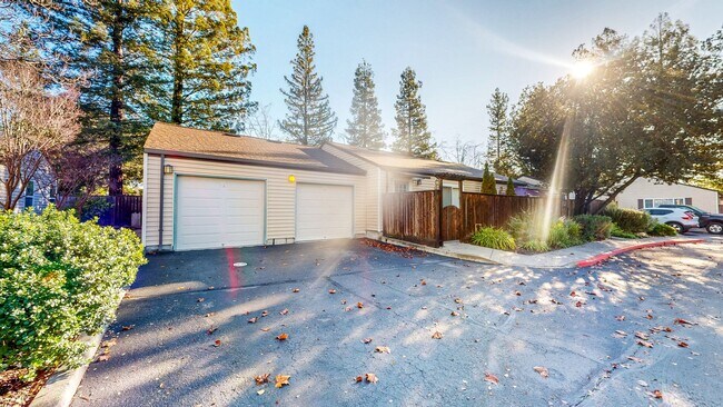 Foto del edificio - Cozy 1 bedroom 1 bath end unit condo with 1 car garage and private patio located next to Peterson...