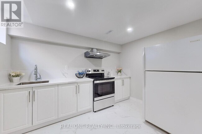 Photo du bâtiment - 27 Gladiola Ct