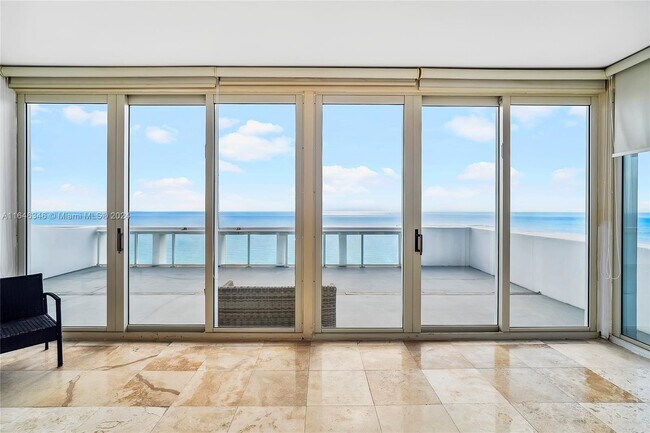 Building Photo - 9499 Collins Ave