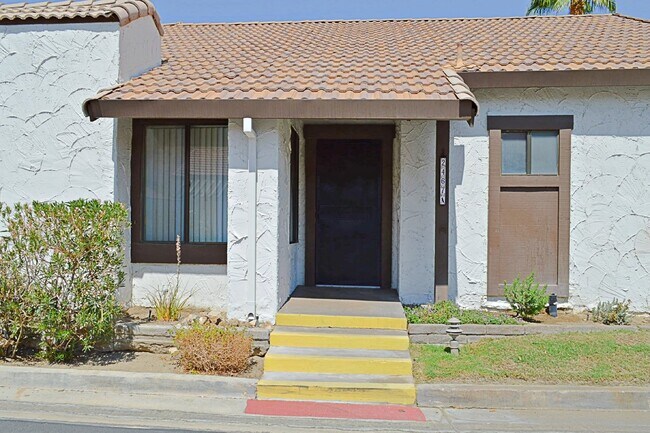 Building Photo - "Chic Palm Springs Condo: 2-Bed, 2-Bath Re...