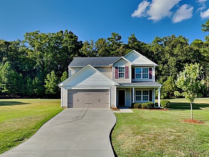 Primary Photo - Spacious 3-Bedroom Home with Loft and Main...