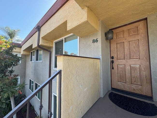 Building Photo - Upstairs Two Bedroom Condo with in-unit La...