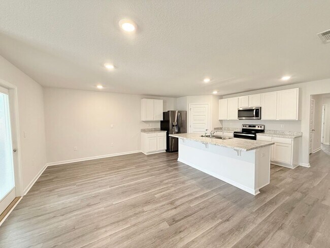 Foto del edificio - Spacious 4-Bedroom Home - Woodlands