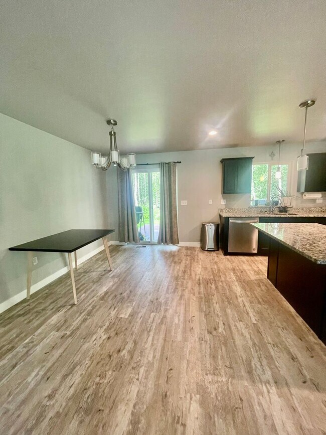 Building Photo - Wonderful Ranch Style home on over an acre in a great location!  3 bed/2 bath/2 car garage with a...