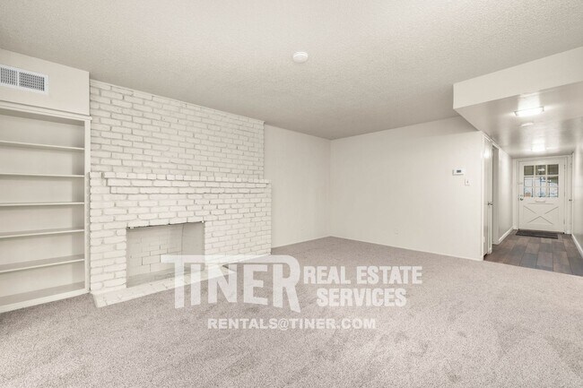Building Photo - Charming and updated! Two bedroom duplex -...