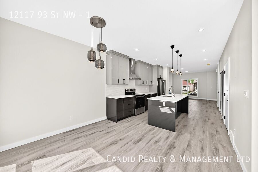 Building Photo - Brand new, Pet-Friendly Brand 3-Bedroom Main Suite with Double Detached Garage