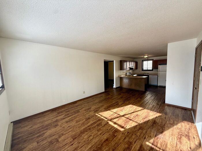 Primary Photo - Cozy 2 Bed/1 Bath Apartment in North Loveland. New Wood Floors! RENT INCLUDES: Gas/Water/Sewer/Trash