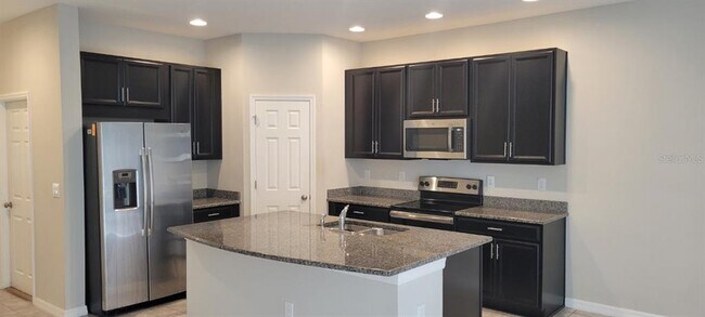 Foto del edificio - 7025 Grand Elm Dr