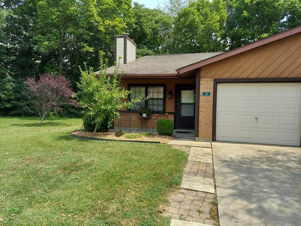 One step into the home via front door or garage door - 48 Rabbit Trail Dr