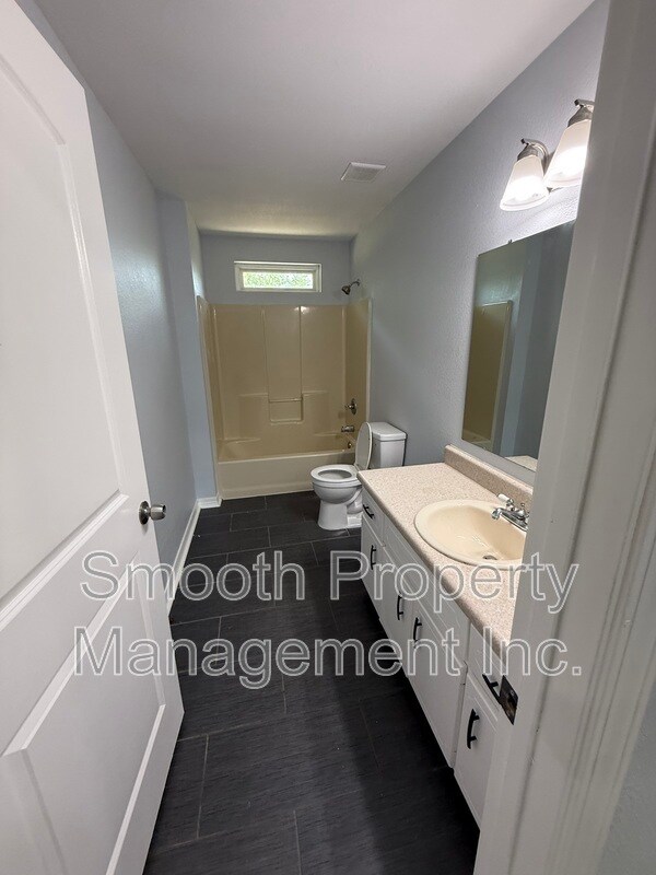 Foto del edificio - 8699 Riverstone Rd