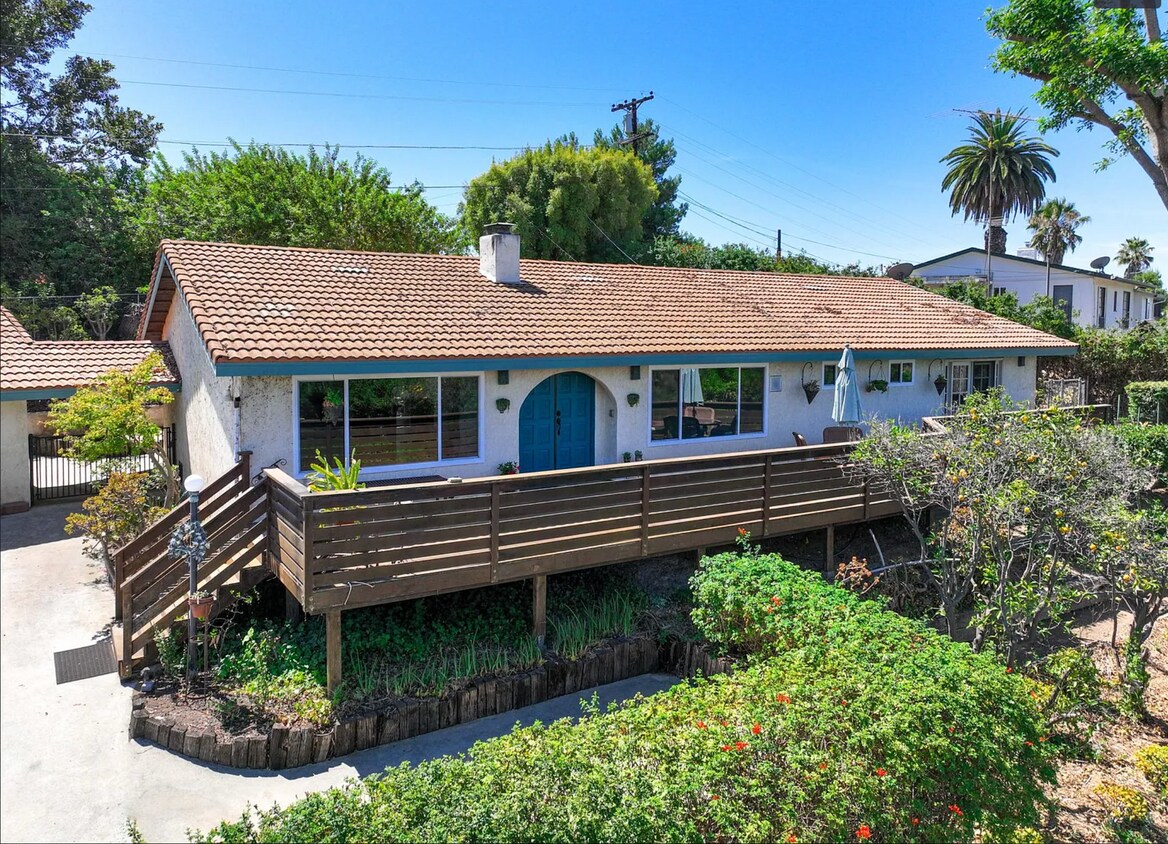 Front of Home with Expansive Deck - 1831 Highgrove Dr