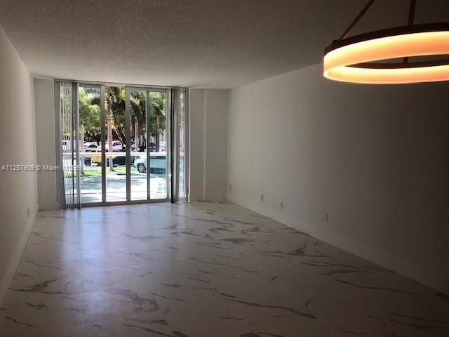 Building Photo - 19380 Collins Ave