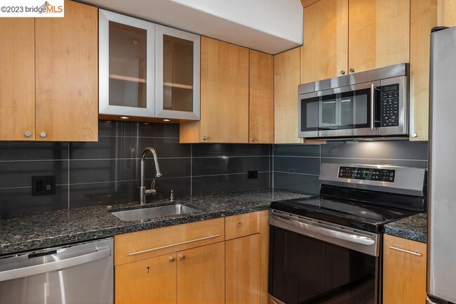 Kitchen with Induction Stove - 6363 Christie Ave