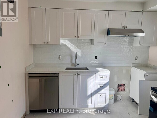 Photo du bâtiment - 75 Holland Ave