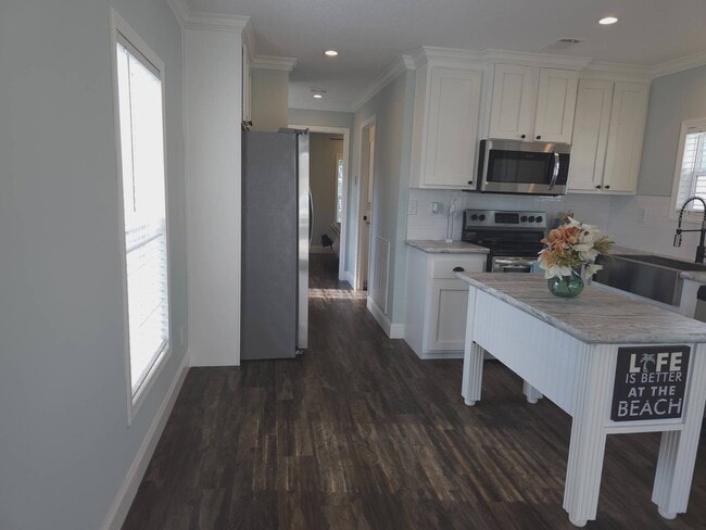 Building Photo - 200 S Banana River Dr