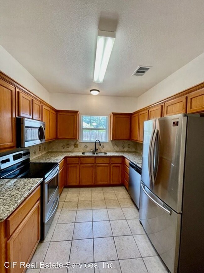 Building Photo - 4 br, 2 bath House - 10317 Peony Ln.