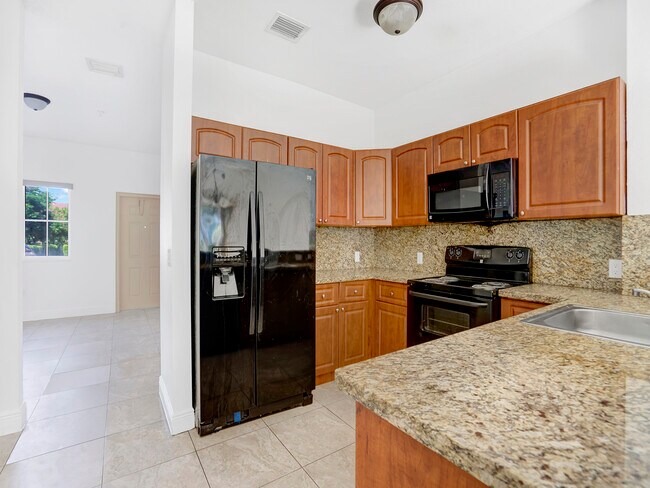 Building Photo - 18240 NW 59th Ave