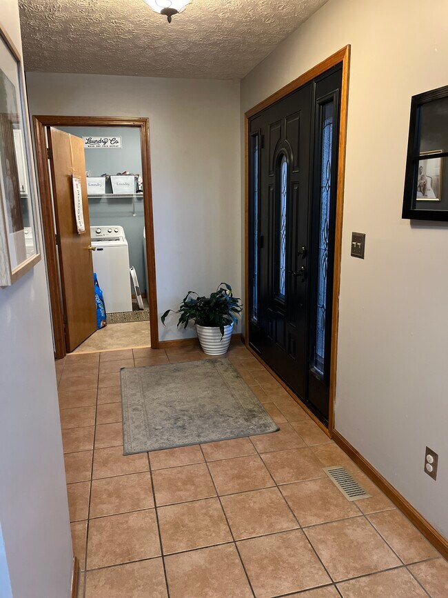 Foyer and Laundry Room - 3052 N Andy Way