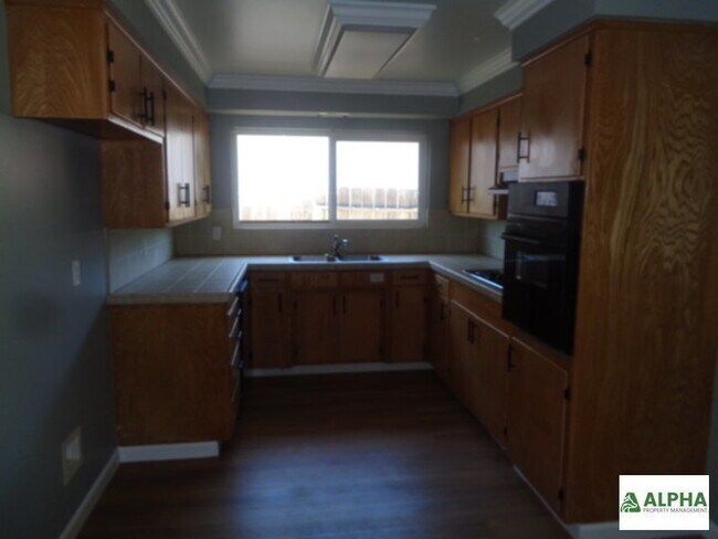 Building Photo - nice three bedroom one bath two car garage