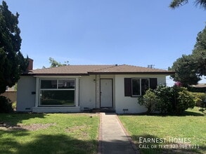Building Photo - 9802 E Camino Real Ave