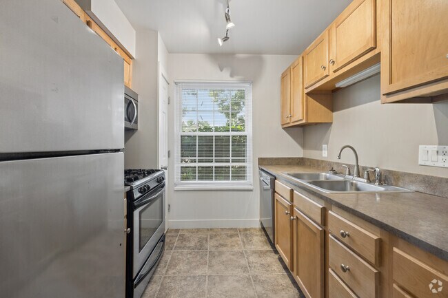 2 habitaciones, 1.5 baños - 1296 pies cuadrados - Cocina - Westgate Village Townhouses