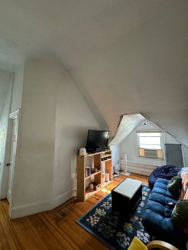Living Area with Vaulted Ceiling - 5601 Wilkins Ave (Pittsburgh, PA)