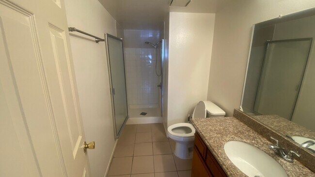Building Photo - Renovated Townhome, Attached Garage, in Gated HOA Community *READ*