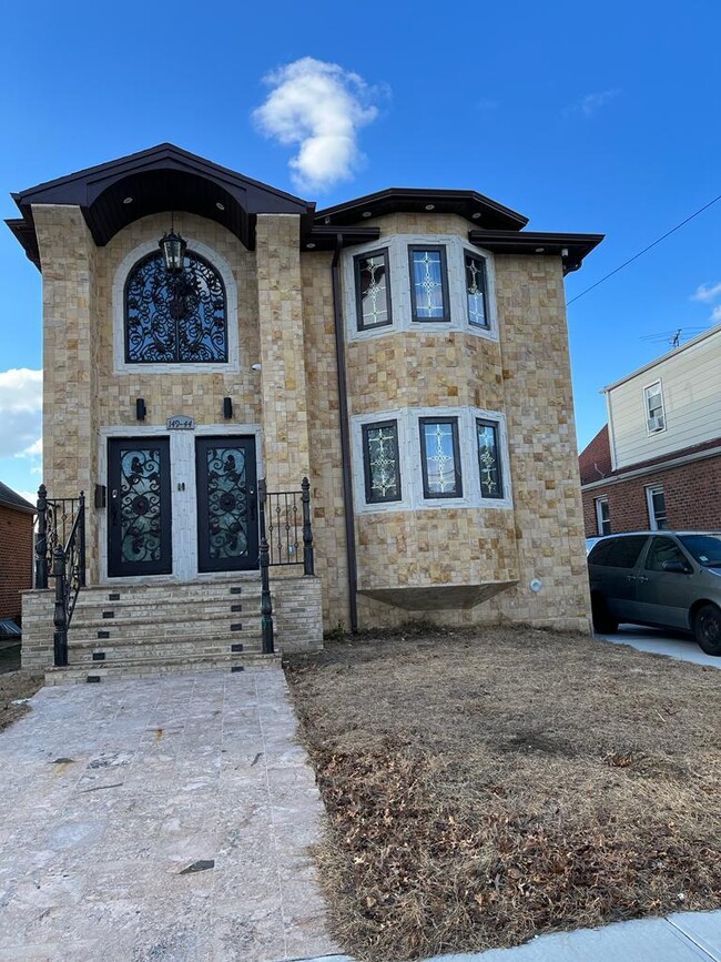 Front of the home, driveway is on the right - 14944 122nd St