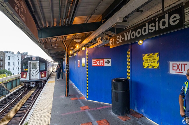 The 7 subway train stops in Woodside, Queens.