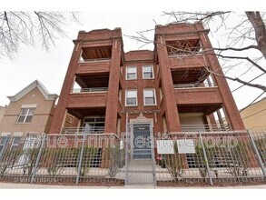 Building Photo - 1540 E 67th Pl