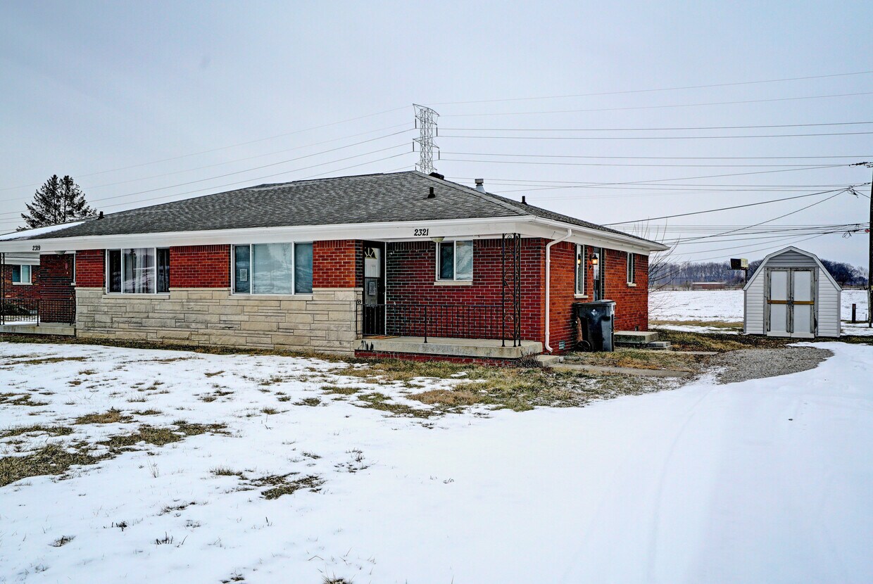 Right side unit Exterior - 2321 S Hunter Rd