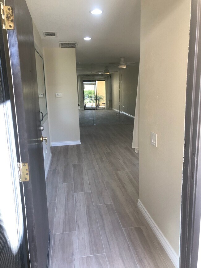 Navarro beige wood plank porcelain tile. - 2822 N Auburn Ct