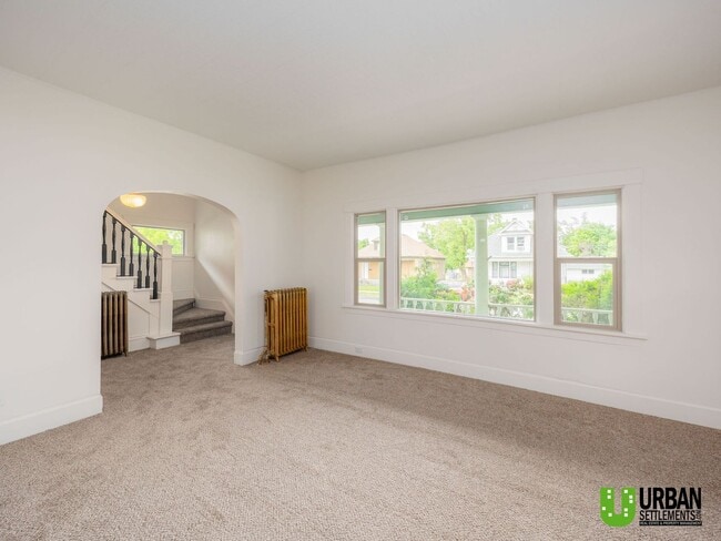 Building Photo - Spacious 4-Bedroom Home with 2-Car Garage, Basement Storage & Flexible Living Space in North Spokane