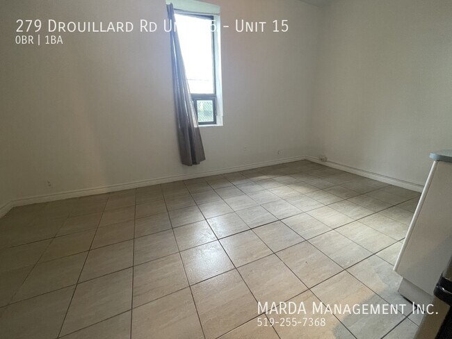Building Photo - COZY BACHELOR UNIT - INCLUSIVE + FREE WIFI!!