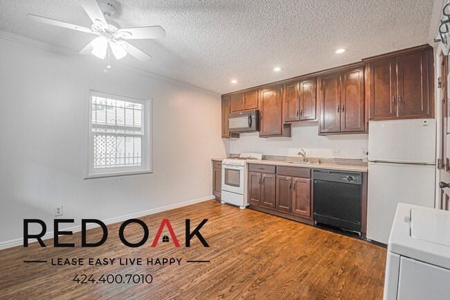 Building Photo - 1309 W 36th Pl