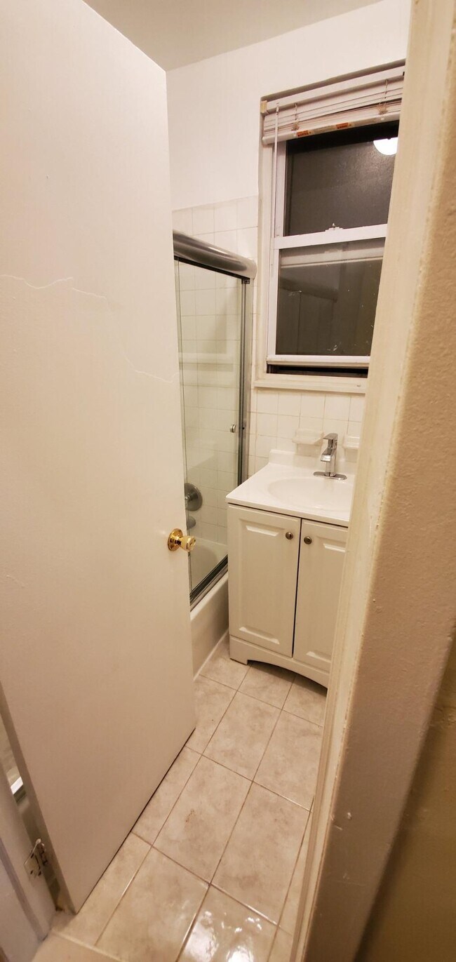 New shower door - 227 15th St