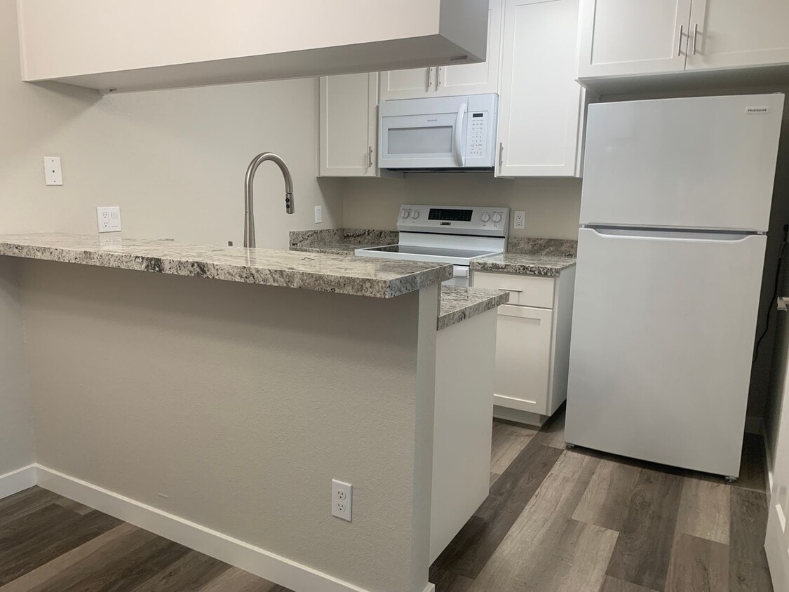 Primary Photo - Downstairs 2 bedroom 2 bath brand new condo