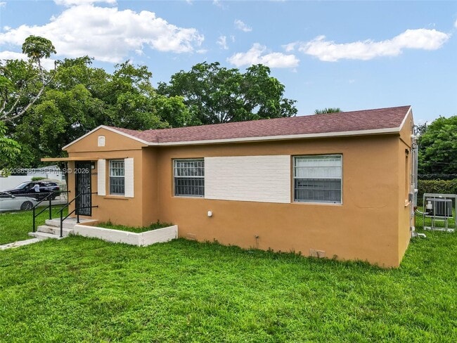 Building Photo - 6499 NW 29th Ave