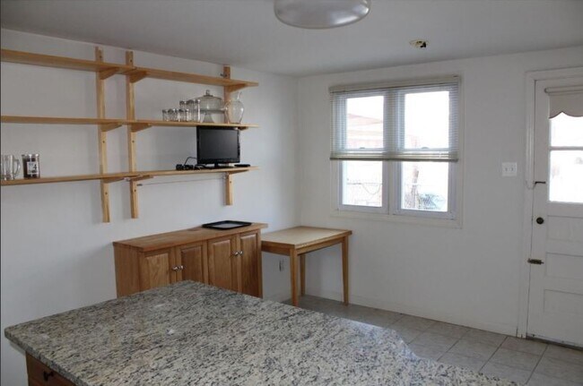 Additional open shelving storage and dining room. - 116 Chadwick Avenue