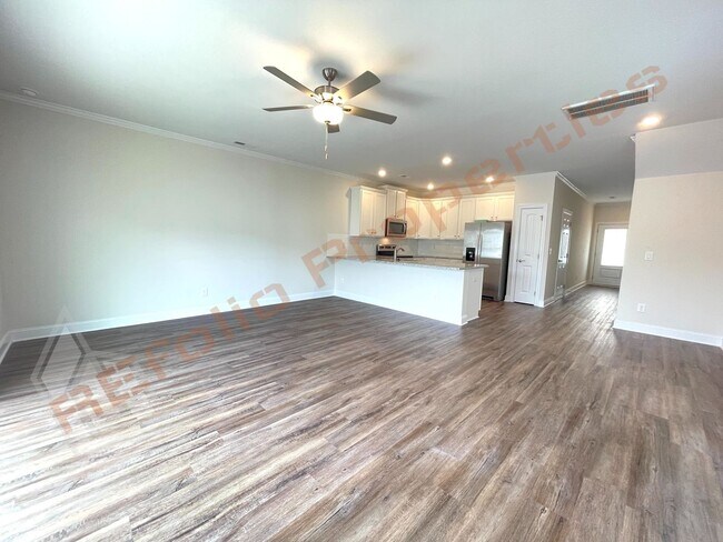 Foto del edificio - 6911 Outfall Point Ln
