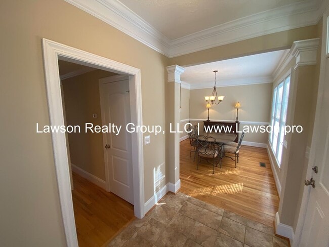 Building Photo - Colonial Green Row Home with Two Car Garage