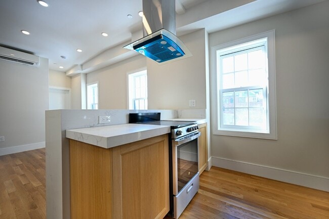 Building Photo - Brand New Penthouse in Bay Village, Central Heat/AC, In-Unit Washer and Dryer, Private Roof Deck