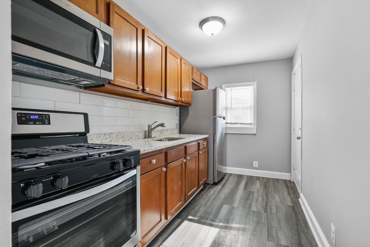 Primary Photo - Fully Renovated & Fenced Backpad!
