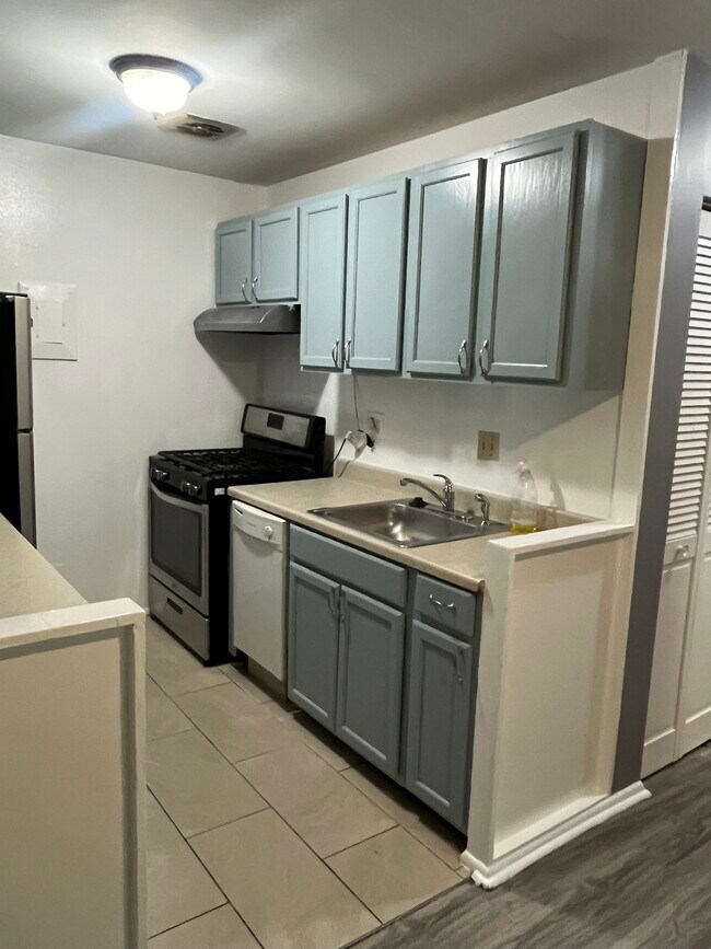 Stainless steel fridge and stove - 5400 85th Ave