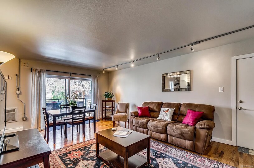 well-lit, open living room - 1245 Columbine St