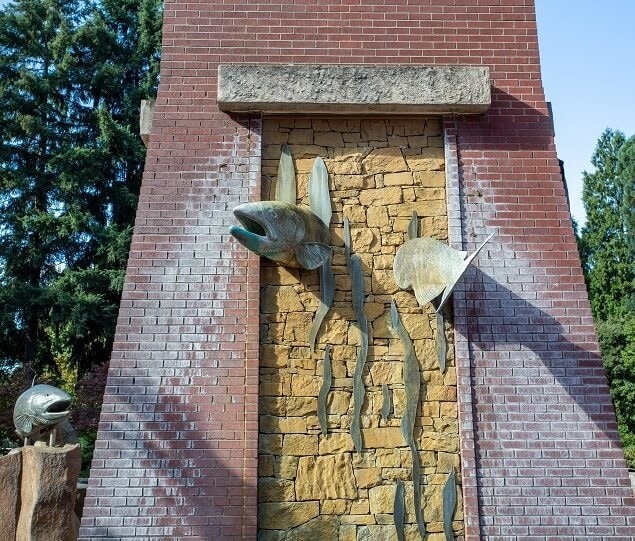 The Salmon Bell Tower features a glockenspiel depicting Native American lore