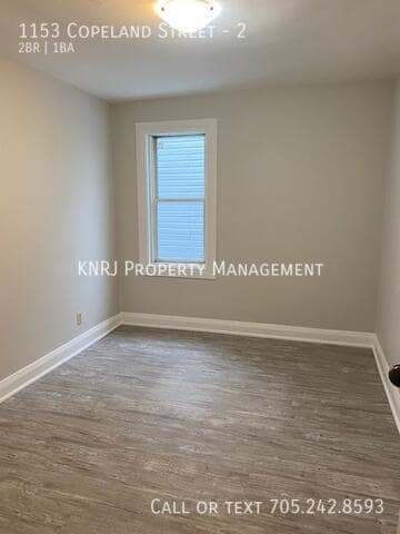 Building Photo - Two Bedroom Plus Den