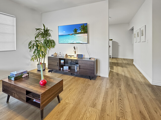 Entertainment area and entrance to kitchen - 5852 Ernest Ave