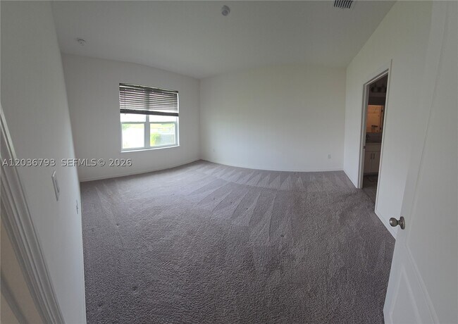 Building Photo - 10500 SW Vasari Way