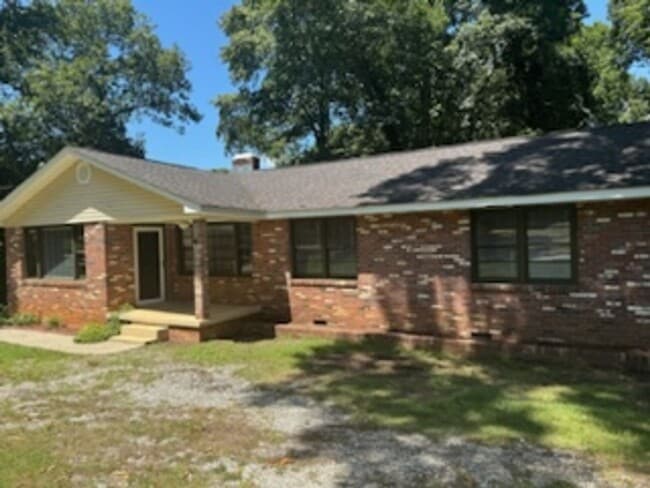 Building Photo - Brick Mid-Century Modern Home in Great Loc...